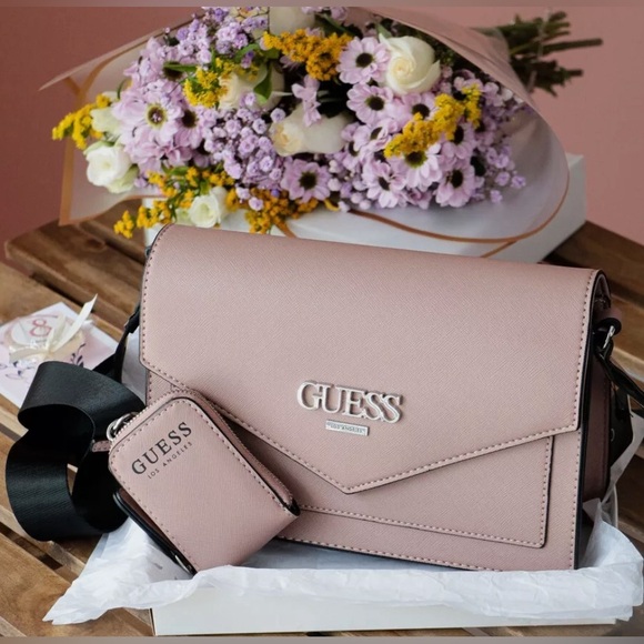GUESS Women’s Nausha Crossbody Bag with Mini Bag Charm Mauve - Picture 1 of 7